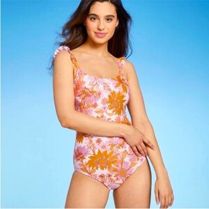 Kona Sol Ruffle Strap One Piece
Swimsuit SmallNew w/ Tags Brown and Orange